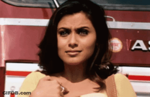 A Woman Stands In Front Of A Red And White Bus That Says A On It GIF