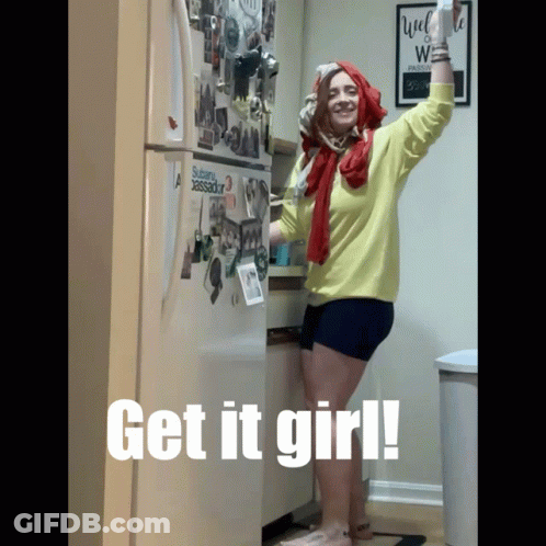 A Woman Stands In Front Of A Refrigerator With The Words Get It Girl Written On It GIF