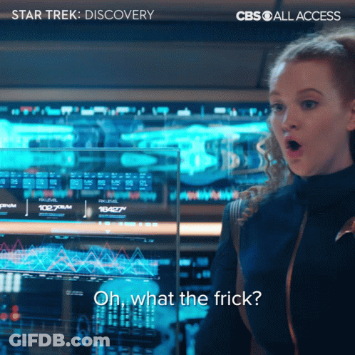 A Woman Stands In Front Of A Screen That Says Oh What The Frick On It GIF
