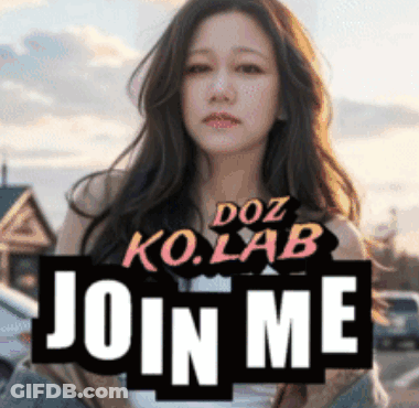A Woman Stands In Front Of A Sign That Reads Join Me GIF