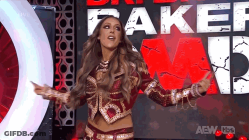 A Woman Stands In Front Of A Sign That Says Fake GIF