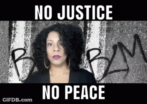 A Woman Stands In Front Of A Wall That Says Bm On It GIF