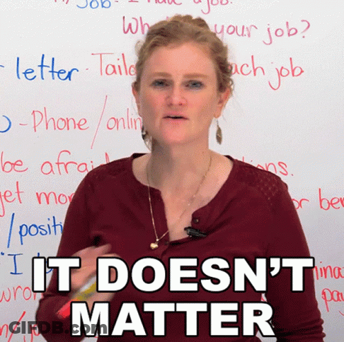 A Woman Stands In Front Of A White Board With The Words It Does N't Matter Written On It GIF