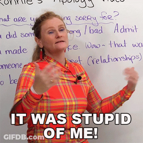 A Woman Stands In Front Of A White Board With The Words It Was Stupid Of Me GIF