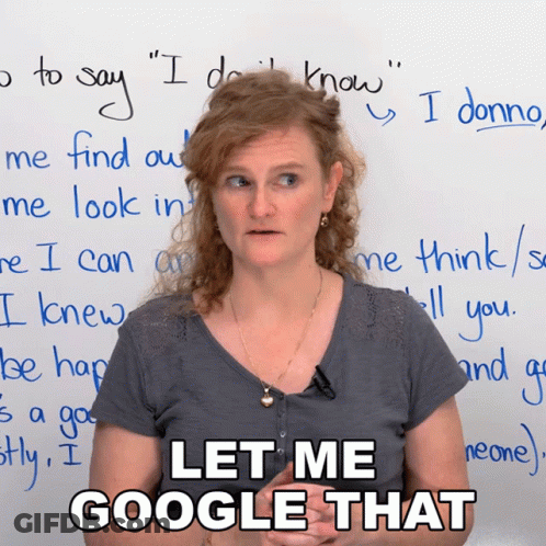 A Woman Stands In Front Of A White Board With The Words Let Me Google That Written On It GIF