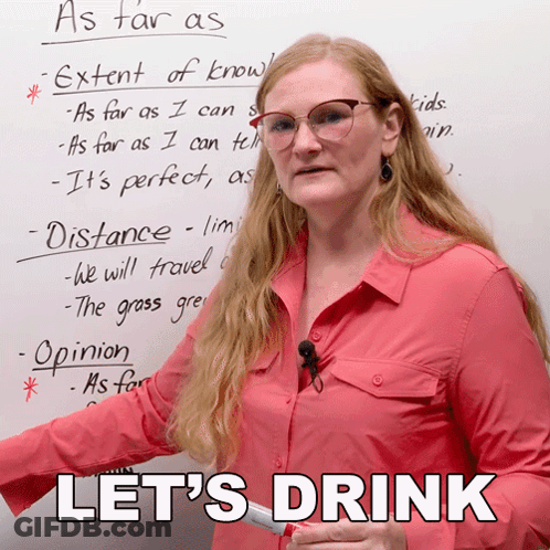 A Woman Stands In Front Of A Whiteboard With The Words Let 'S Drink Written On It GIF