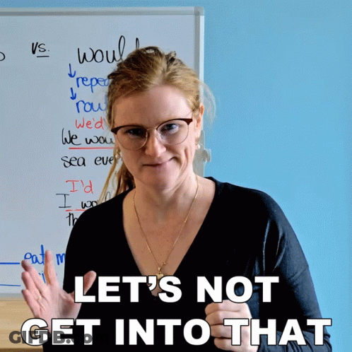 A Woman Stands In Front Of A Whiteboard With The Words Let 'S Not Get Into That Written On It GIF
