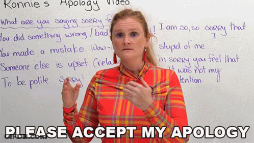 Woman Standing In Front Of Whiteboard Apology GIF