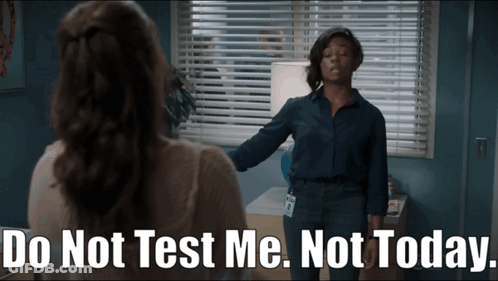 A Woman Stands In Front Of A Window With Blinds And Says Do Not Test Me Not Today GIF