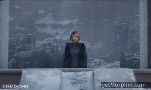 A Woman Stands In Front Of A Window With The Website Getmorphin.com On The Bottom GIF