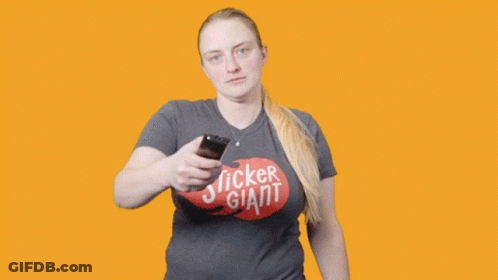 A Woman Stands In Front Of A Yellow Background With The Word Muted GIF