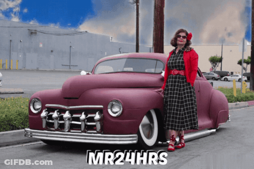 A Woman Stands Next To A Purple Car With The Words Mr24hrs Written On The Bottom GIF