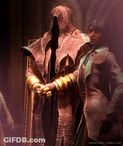 A Woman Stands Next To A Statue Of A Man With A Hood And The Words Eurodynamic.tumblr.com On The Bottom Right GIF