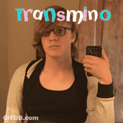 A Woman Taking A Picture Of Herself With The Word Transmin On The Top GIF