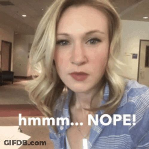 A Woman Taking A Selfie With The Words Nope Written On The Bottom GIF