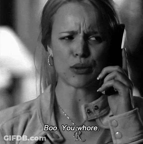 A Woman Talking On A Cell Phone With The Words Boo You Whore Written Below Her GIF