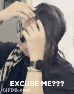A Woman Talking On A Cell Phone With The Words " Excuse Me " On The Bottom GIF