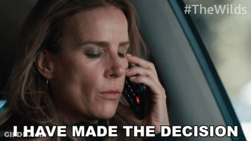 A Woman Talking On A Cell Phone With The Words " I Have Made The Decision " Above Her GIF