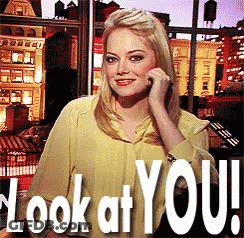 A Woman Talking On A Cell Phone With The Words " Look At You " Written Below Her GIF