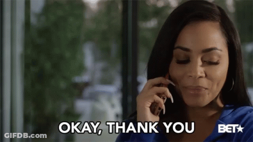 A Woman Talking On A Cell Phone With The Words Okay Thank You Behind Her GIF
