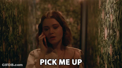 A Woman Talking On A Cell Phone With The Words Pick Me Up Above Her Head GIF