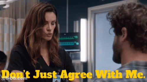 A Woman Talking To A Man With The Words " Do N't Just Agree With Me " GIF