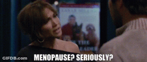 A Woman Talking To A Man With The Words Menopause Seriously GIF