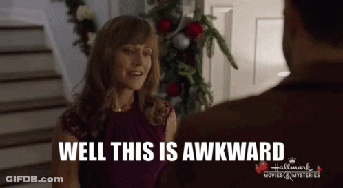 A Woman Talking To A Man With The Words Well This Is Awkward On The Bottom GIF