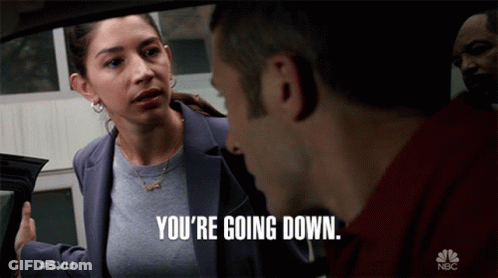 A Woman Talking To A Man With The Words You 'Re Going Down On The Bottom GIF