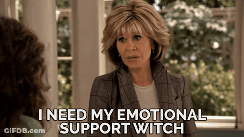 A Woman Talking To Another Woman With The Words I Need My Emotional Support Witch Below Her GIF