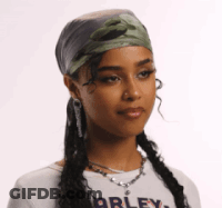 A Woman Wearing A Bandana And A Shirt That Says Harley On It GIF