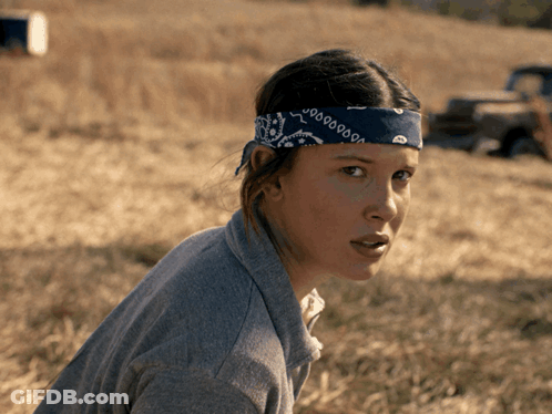 A Woman Wearing A Bandana That Says 000000 GIF