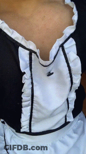 A Woman Wearing A Black And White Maid Dress GIF