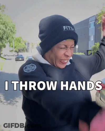 A Woman Wearing A Black Beanie And A Black Jacket Says " I Throw Hands " GIF