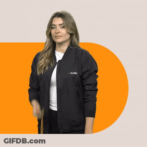 A Woman Wearing A Black Bomber Jacket That Says ' Enolu ' On It GIF