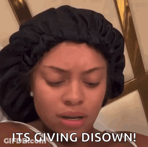 A Woman Wearing A Black Hat Says It 'S Giving Disown ! GIF
