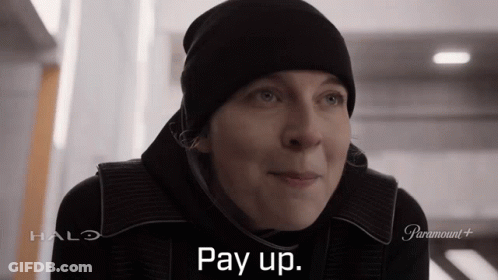 A Woman Wearing A Black Hat Says Pay Up In A Halo Advertisement GIF