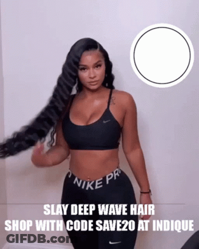 A Woman Wearing A Black Nike Pro Bra And Pants GIF