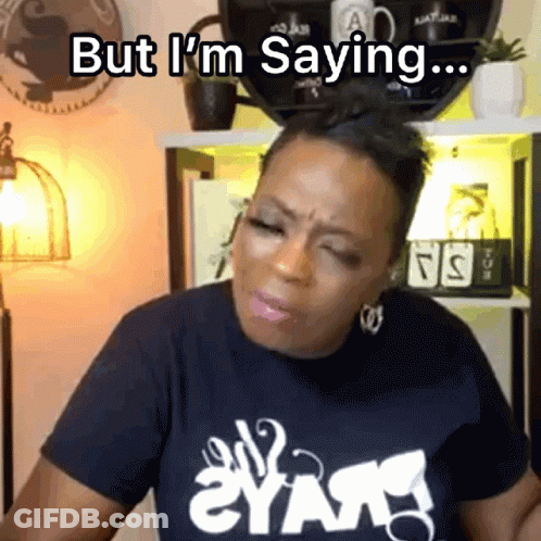A Woman Wearing A Black Shirt That Says " But I 'M Saying " On It GIF
