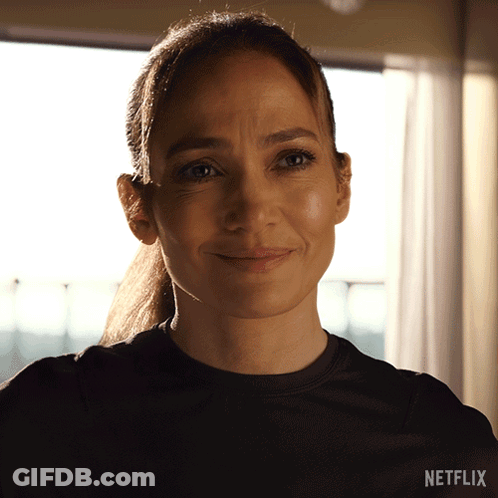 Woman Wearing Black Shirt With Netflix Logo GIF