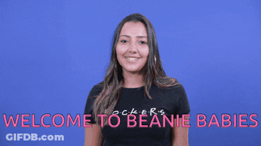 A Woman Wearing A Black Shirt With The Words Welcome To Beanie Babies GIF