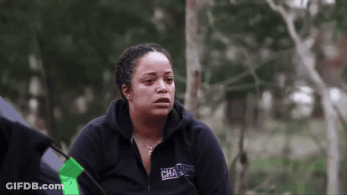 A Woman Wearing A Black Sweatshirt With The Word Challenge On It GIF