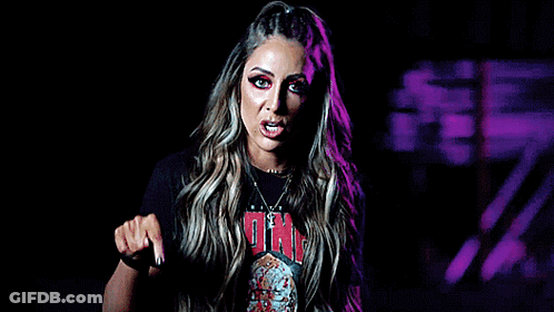 A Woman Wearing A Black T-Shirt That Says One On It GIF