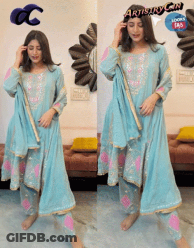 A Woman Wearing A Blue And Pink Dress With The Words Artistry Can Looks Fab GIF