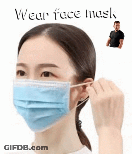 A Woman Wearing A Blue Face Mask With A Man Standing Behind Her . GIF