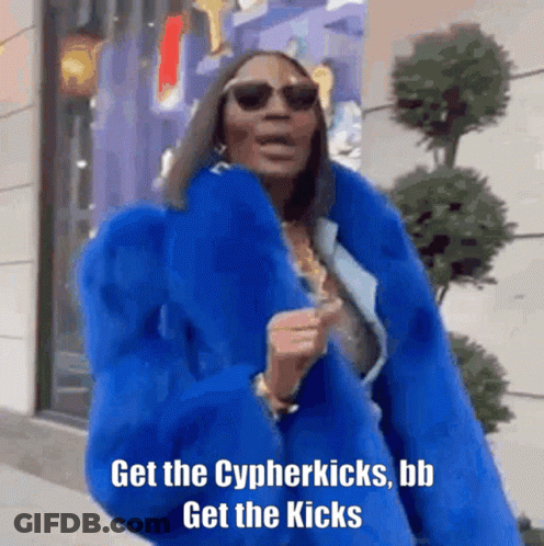 A Woman Wearing A Blue Fur Coat And Sunglasses Says Get The Cypherkicks , Bb Get The Kicks . GIF