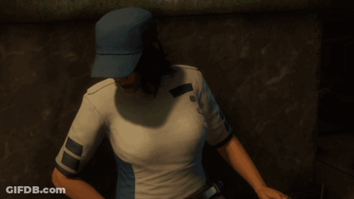 A Woman Wearing A Blue Hat And A White Shirt Is Holding A Tablet GIF