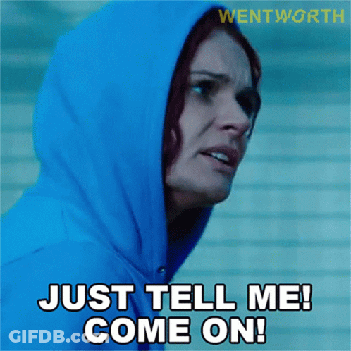 A Woman Wearing A Blue Hoodie Says " Just Tell Me Come On " GIF