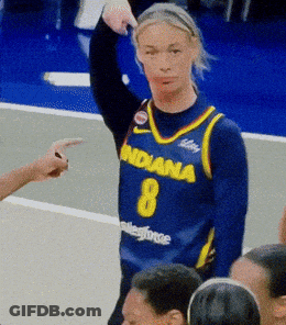 A Woman Wearing A Blue Jersey That Says Indiana 8 On It GIF