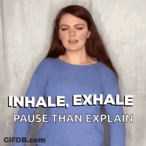 A Woman Wearing A Blue Shirt Says Inhale Exhale Pause Than Explain GIF